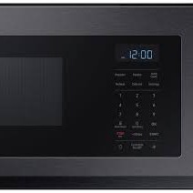 Four &agrave; Micro-Ondes &agrave; Hotte Int&eacute;gr&eacute;e "Profil Bas" de 1,1 pi&sup3; / 400 CFM en Acier Inoxydable Noir Samsung ( ME11A7510DG )