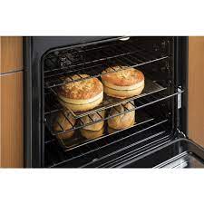 Cuisini&egrave;re au Gaz Bicombustible Encastr&eacute;e de 30" / 5,6 pi&sup3; avec Four &agrave; Convection en Acier Inoxydable GE PROFILE ( PC2S930SELSS )
